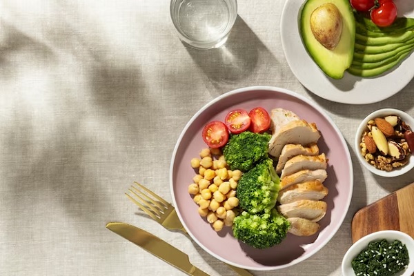 healthy dinner with vegetables, proteins and fruits
