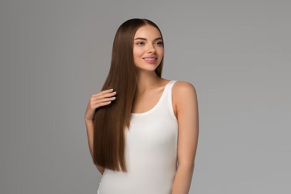 a woman showing The Benefits of Keratin to the Hair