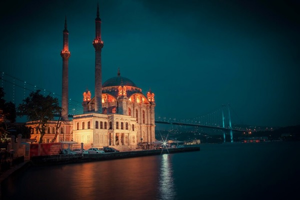 a photo of a landscape in turkey with the sea at night - best hair transplants Turkey