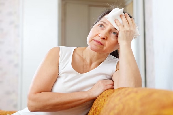 a woman thinking about hair in menopause